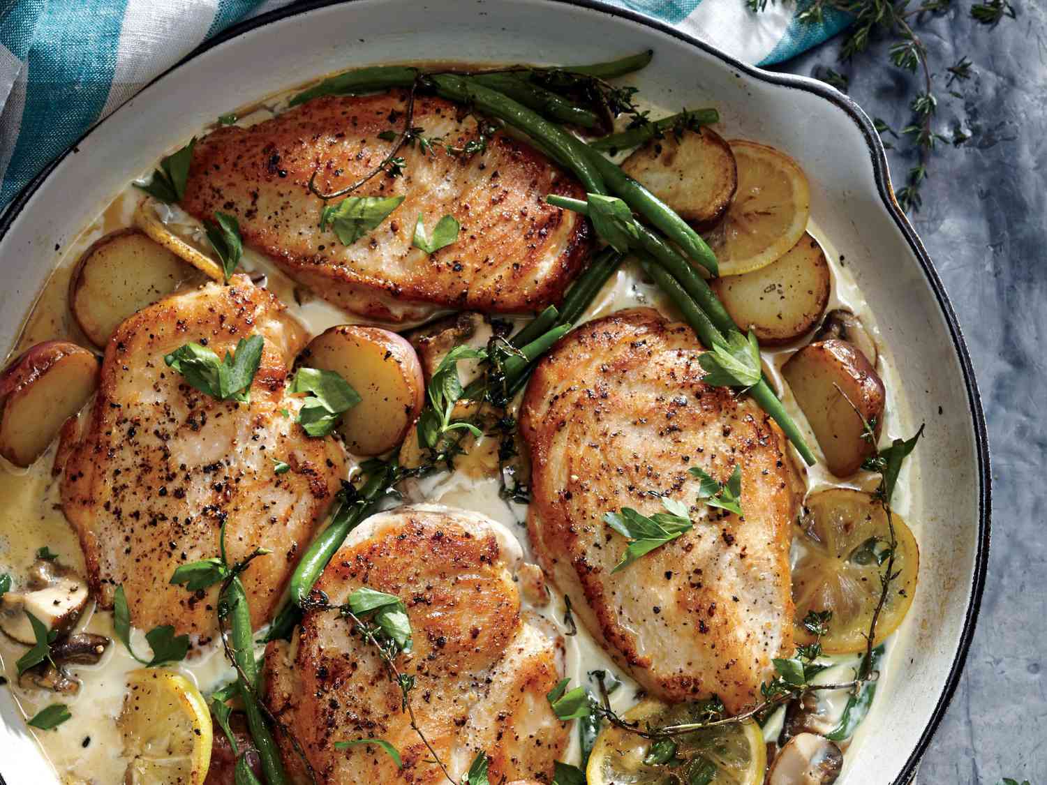 Weeknight Lemon Chicken Skillet Dinner in a skillet for serving