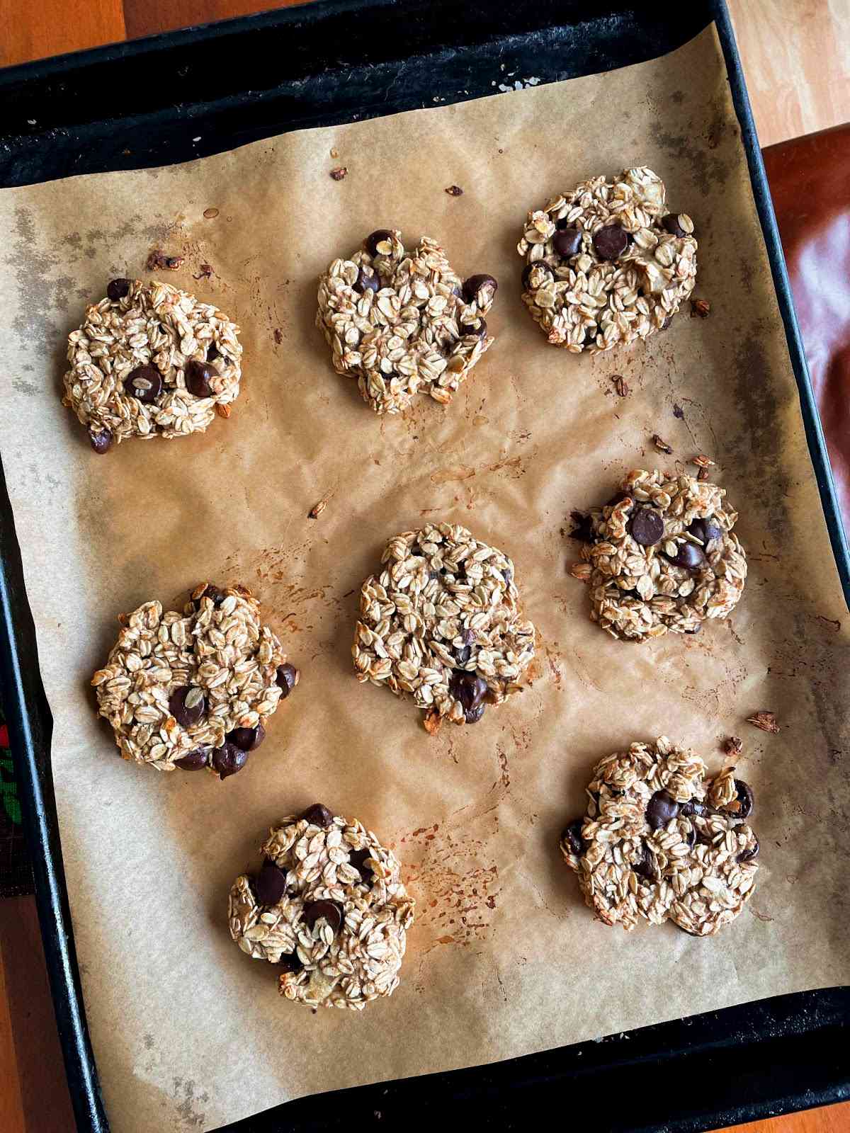 a recipe photo of the banana bread cookies on a cookie sheet
