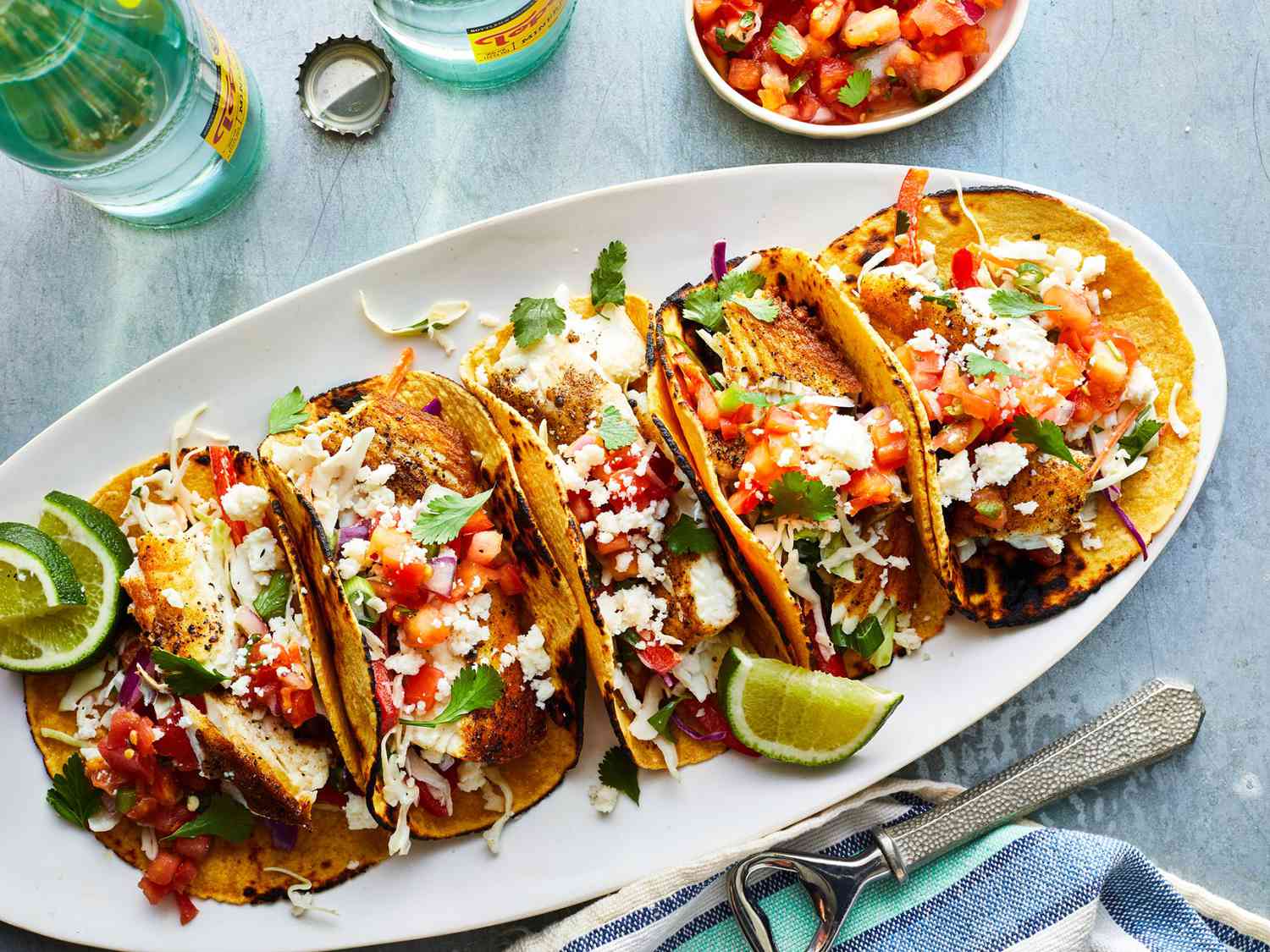 Seared Halibut Fish Tacos With Cilantro Slaw recipe on a white plate for serving